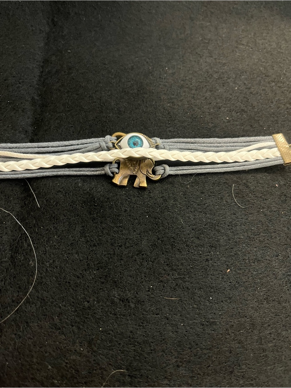 Braided White & Gray Elephant Charm Bracelet with Blue Eye Accent